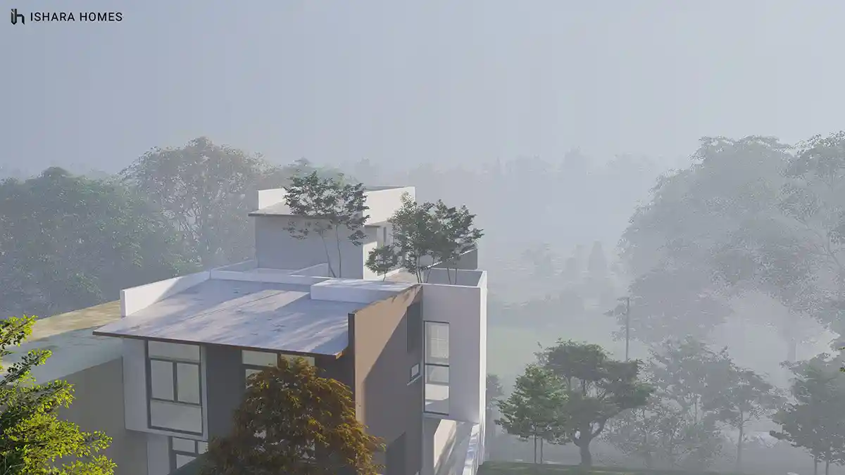 Morning mist rolls through the valley below as the home's flat-roofed upper level and pitched metal roof emerge above the treeline, rooftop...