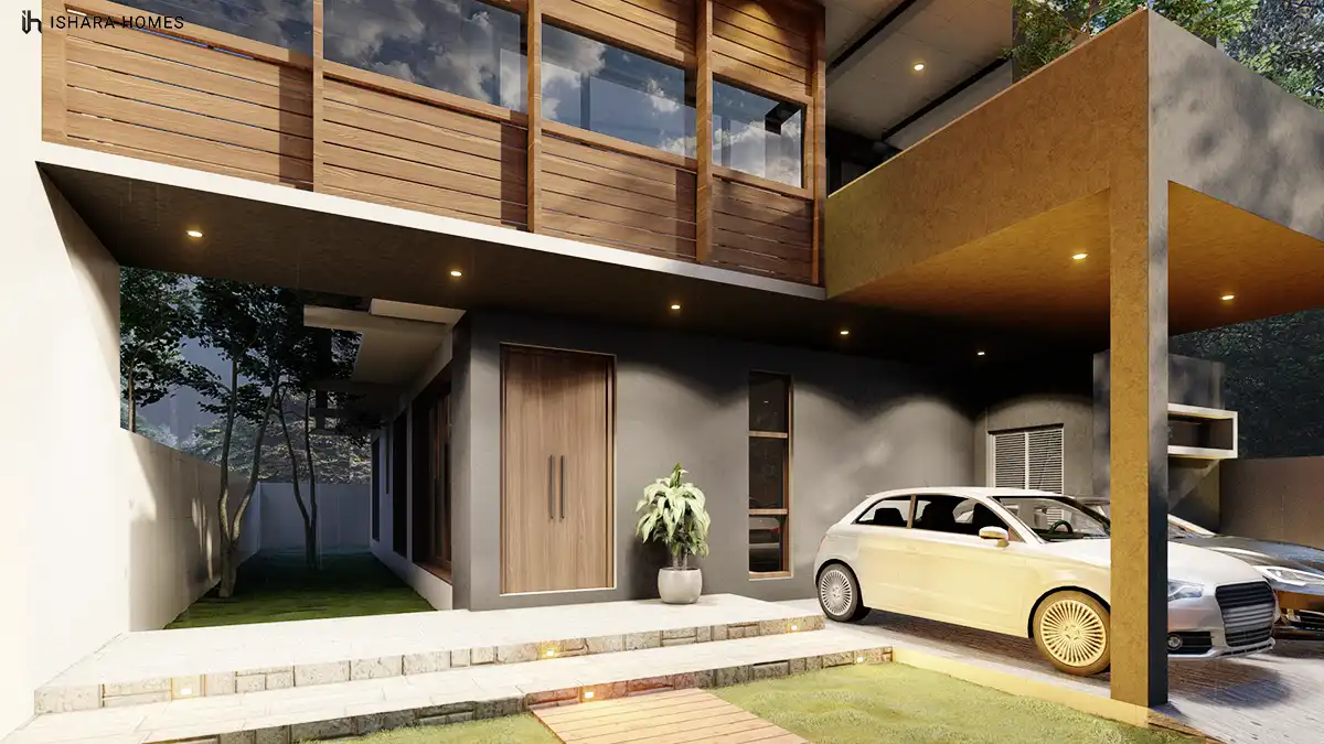 The covered entry walkway curves past clipped grass and stone steps toward a timber front door, with a single hatchback parked under a...