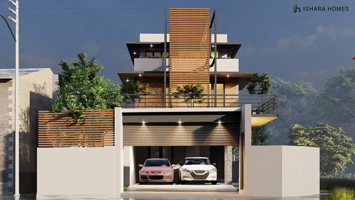 Twin cars sit ready beneath the roller shutter as the timber slat tower and brick balcony glow warmly above, framed by a slatted timber privacy...
