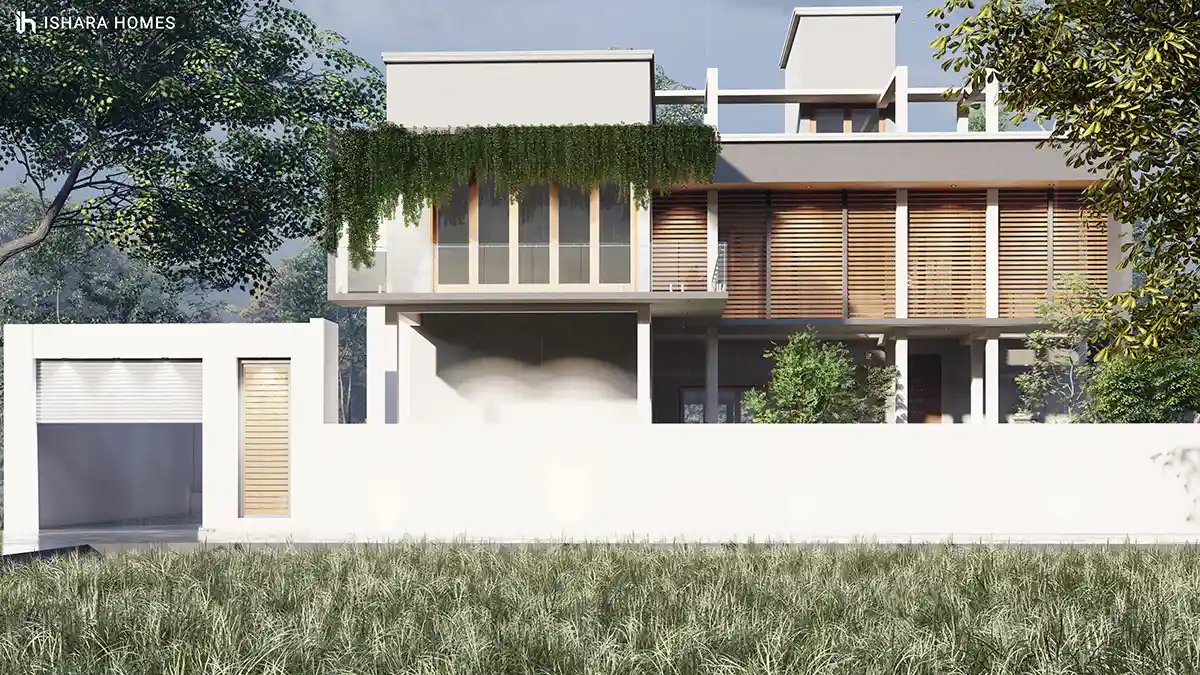 The street-facing elevation on a bright day, framed by tall grass in the foreground, with the same green-draped balcony and timber screen catching...