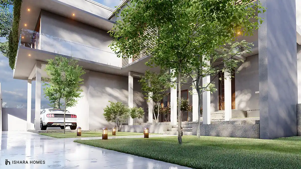 The covered entrance walk, where a row of white columns and a sports car under the carport lead past young trees and lantern-style path lights to...