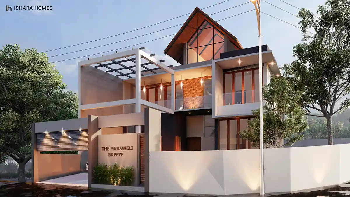 A steep glazed gable crowns The Mahaweli Breeze, its exposed rafters glowing at dusk above an open steel pergola and a brick feature wall visible...