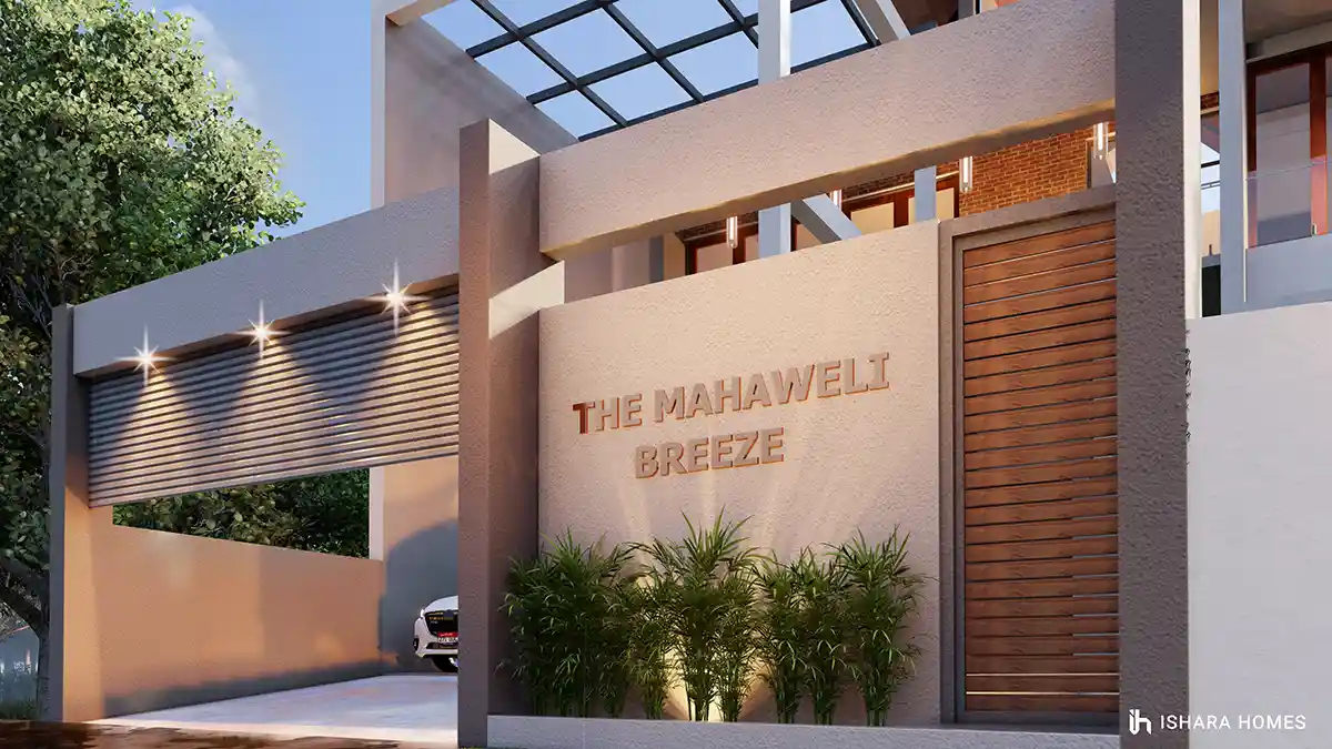 At the entrance wall, the property's name is set in raised lettering beside a timber slatted gate, with bamboo planting and warm spotlighting...