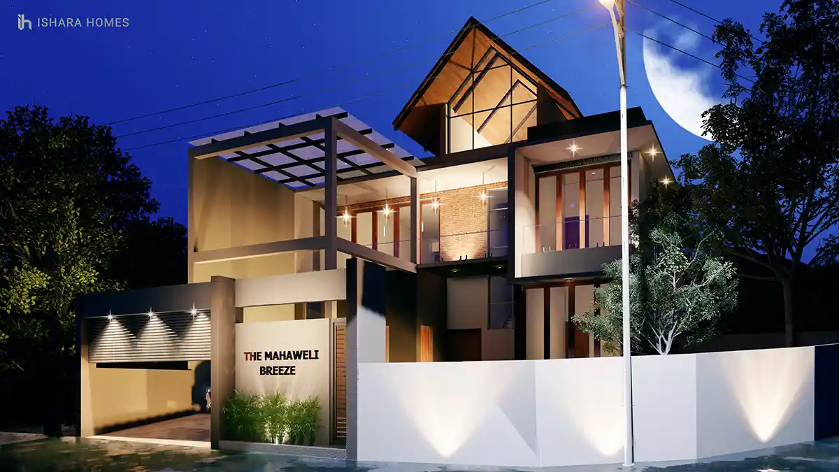 Under a starlit night sky with the moon rising behind it, the home's illuminated brick feature wall and glazed gable give the residence a warm,...
