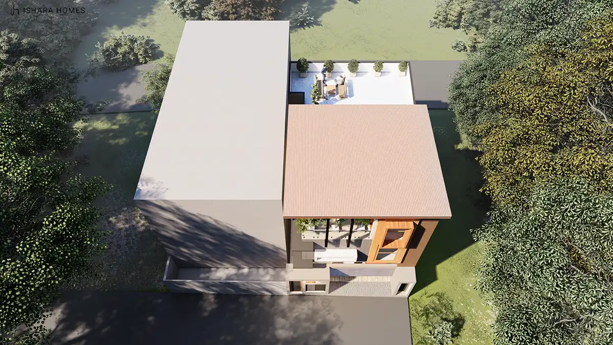 Looking straight down on the roofline, the home's two roof forms meet at a clean seam, with the rear section topped by a pale roof deck and the...
