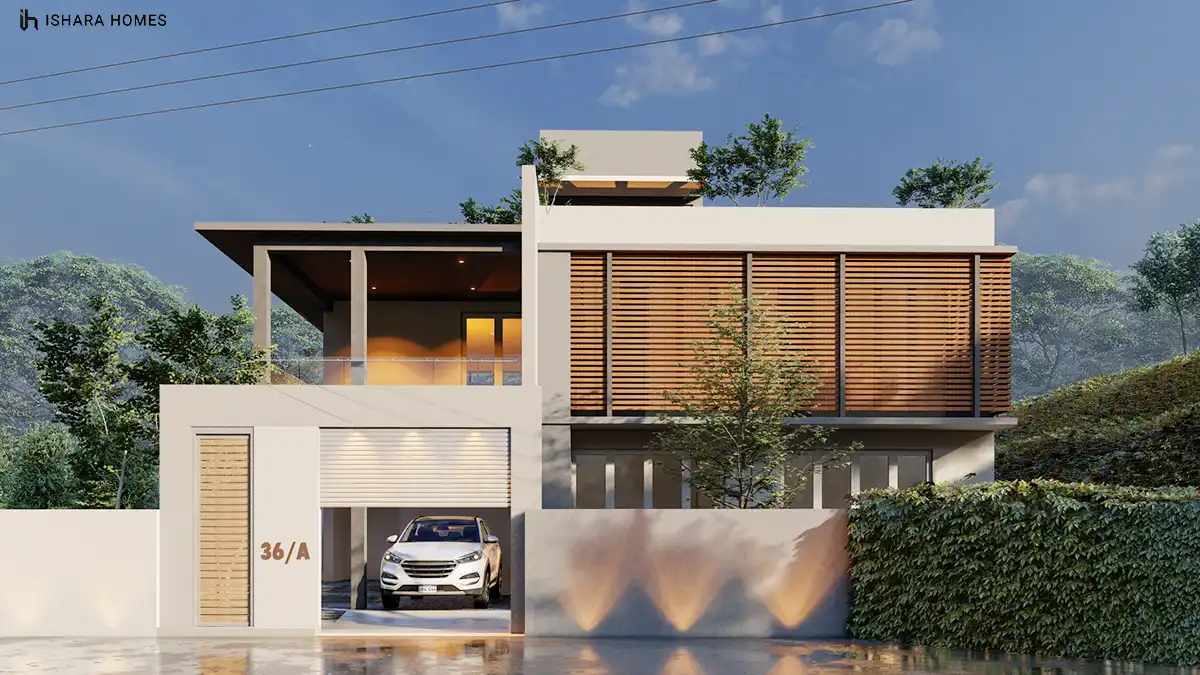 The full daylight façade, with the double garage door raised and a car parked under warm downlights, the timber-clad pivot door beside it marked...