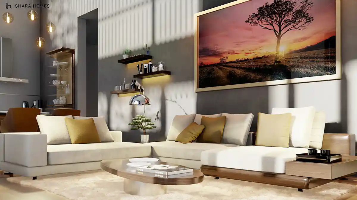 Inside, the living room's cream sectional sofa and mustard cushions sit beneath a large sunset landscape print, warm pendant lighting and a glass...