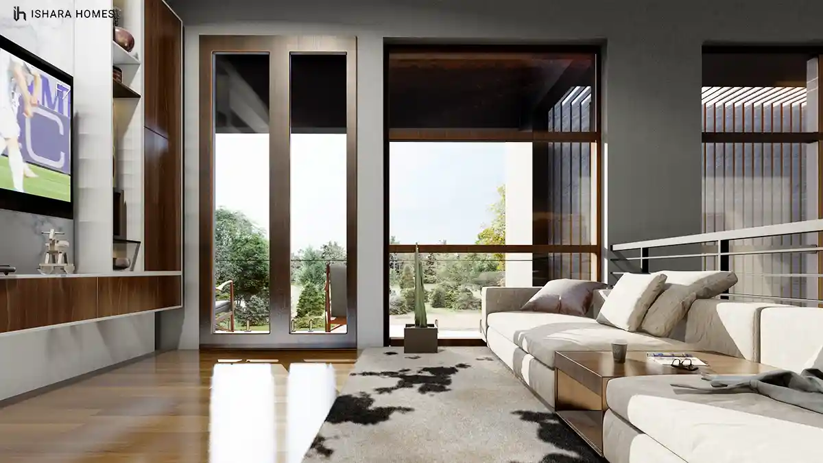 Glimpsed from the seating area, a slim internal staircase and glass balustrade lead to the upper floor, while full-height timber-framed doors open...