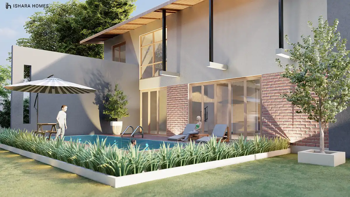 The rear garden and pool area, where brick cladding and full-height glass doors open onto a shaded poolside deck beneath the home's signature...