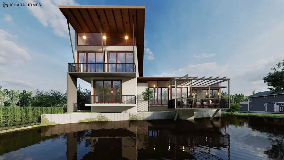 Another angle across the pond at dusk shows the full length of the home's timber-topped roofline and open-air terrace, its lights mirrored in the...